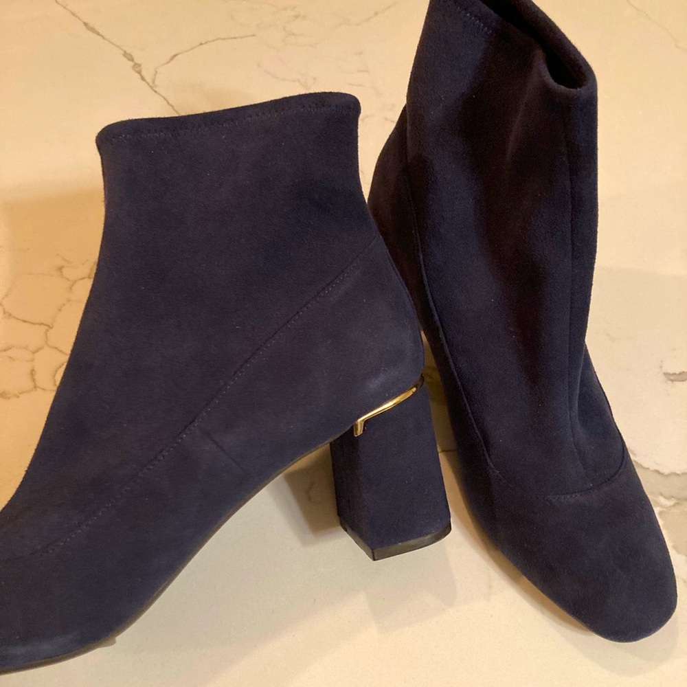 Cole Haan navy suede ankle boots.
